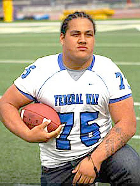 Federal Way High School senior Uso Olive can bench press 455 pounds. He gave a verbal commitment to play football at Portland State University.