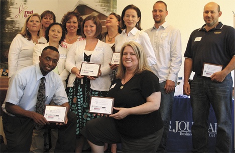 The Federal Way Chamber of Commerce announced new members during its monthly luncheon July 1 at Twin Lakes Golf and Country Club. Pictured (front): Herman C. Brewer