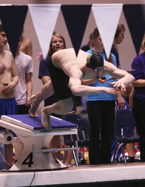 Beamer junior Bart Wanot starts the 50-yard freestyle during the Class 4A State Swimming and Diving Championships at the King County Aquatic Center. Wanot won the 100 backstroke title and finished second in the 50 free.