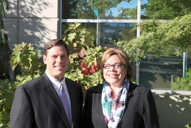 Federal Way Mayor Jim Ferrell stands with City Attorney  Amy Jo Pearsall in front of City Hall.