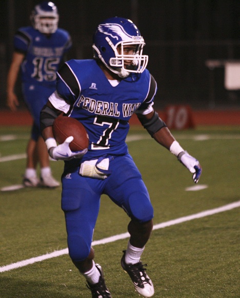 Federal Way senior running back set an SPSL record with seven touchdown runs during a 69-21 win over Thomas Jefferson Thursday night at Federal Way Memorial Stadium. Pinson now has 20 TDs on the season for the playoff-bound Eagles.