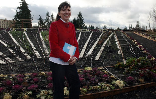 Joelle Dontigny was named volunteer of the year by Federal Way Community Gardens. She is pictured Jan. 30 at the Truman High School garden. Dontigny was presented with a book titled 'How Many People Does It Take To Make A Difference?'