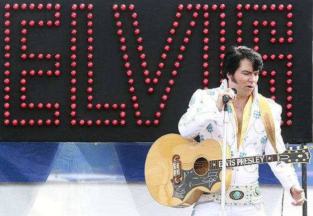 Elvis entertainer Danny Vernon croons the classics during the Federal Way Farmers Market 2013 season kickoff May 11 at The Commons Mall parking lot.