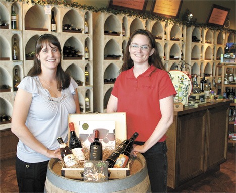 Federal Way WineStyles owner Shanna Watkins (at left) and local store manager Christine Frizzell.