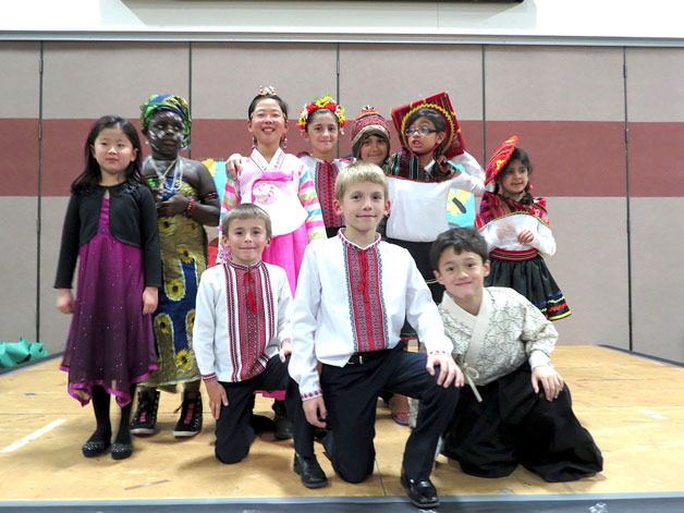 Students pose in different cultural garb during Multicultural Night at Sherwood Forest Elementary on Nov. 20