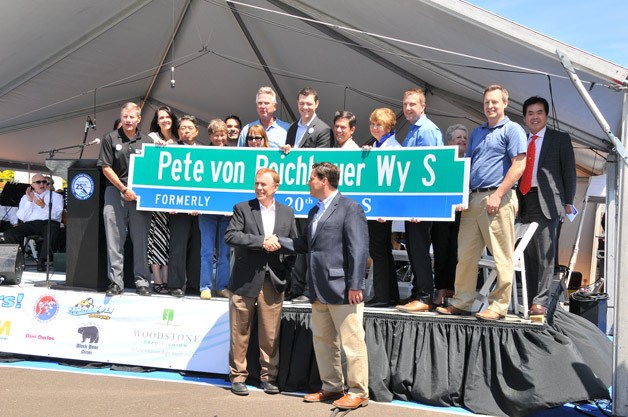 Mayor Jim Ferrell and honored guests dedicate Pete von Reichbauer Way South on Saturday.