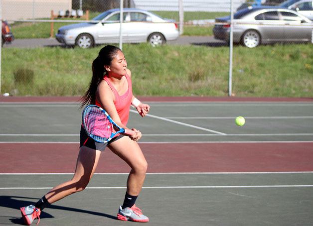 Jefferson’s Crystal Lee executes a forehand stroke during her win. Lee is currently ranked second in the league.