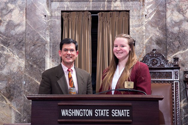 Decatur High School ninth grader Alexis Walker (right) recently served as a page for Sen. Mark Miloscia. Courtesy of Sen. Mark Miloscia