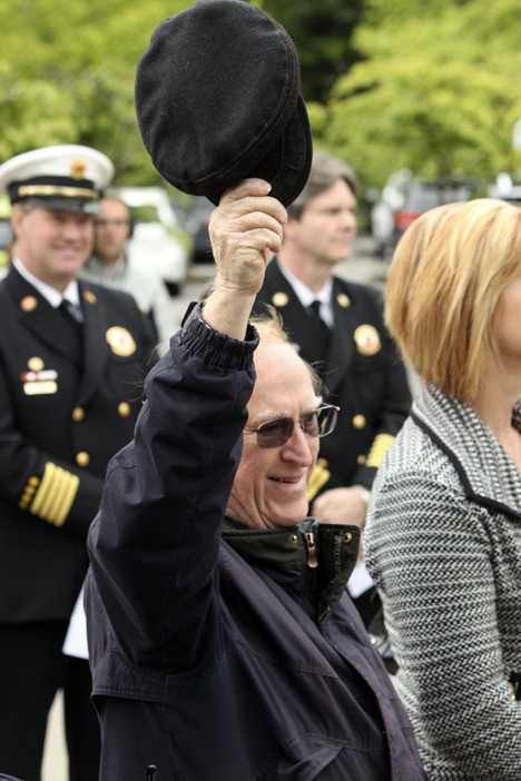 Bob Kellogg raises his hat at the Flag Day Ceremony on June 9. Kellogg is a Kiwanis Club member as well as a veteran.