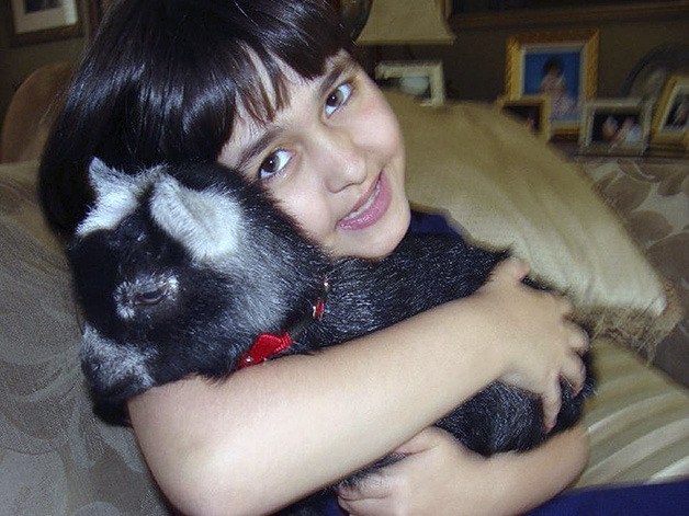 Ava Anissipour and her pet pygmy goat
