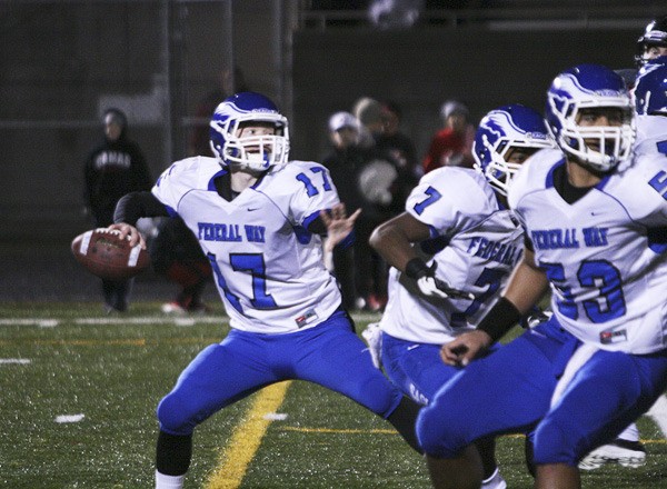 Federal Way senior quarterback Evan Elliott threw for 315 yards and four touchdowns Saturday night against Camas in the state quarterfinals. But the third-ranked Papermakers blew away the Eagles