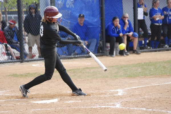 Jefferson senior centerfielder Lexi Goranson smacks a two-RBI double to the left field fence in the state semifinal against Walla Walla on May 26 in Spokane.