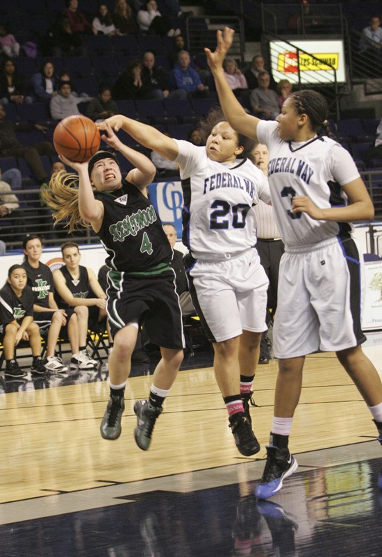 Federal Way seniors Brittany Barrington (center) and Talia Walton are hoping to lead the Eagles to the program’s second state championship this season. Federal Way returns their entire lineup from last year’s state tournament team.