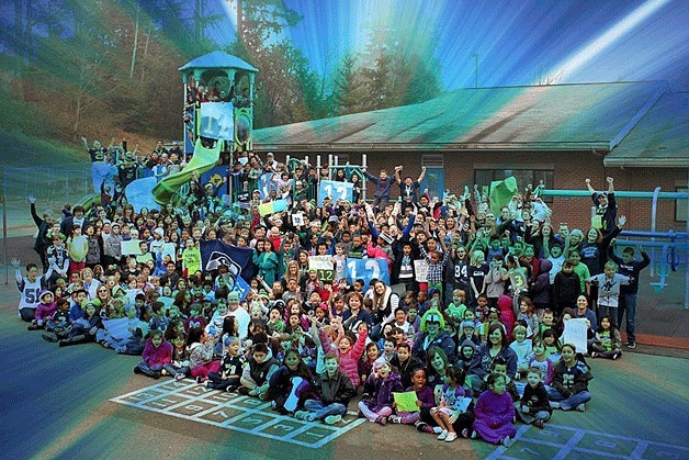 Silver Lake Elementary students and staff showed off their Seahawks pride by wearing the team's colors during Blue Friday last week. School staff also photoshopped this photo with green and blue streaks.