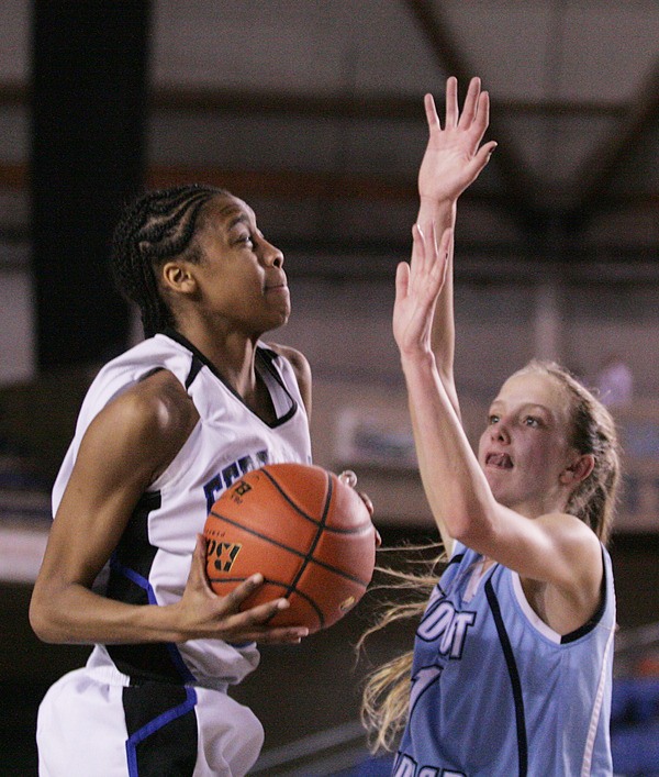 Federal Way’s Dyesha Belhumeur goes up for a shot during the Eagles’ 60-53 win over Mount Rainier Thursday in the quarterfinals of the Class 4A State Girls Basketball Championships inside the Tacoma Dome. Belhumeur finished with eight points.