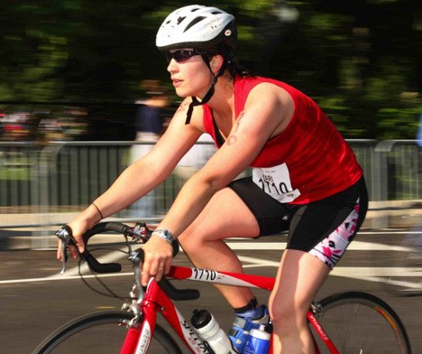 A cyclist rolls in front of Steel Lake Park during the 2008 U.S. Women’s Triathlon. The event will return to Federal Way in July following a one-year hiatus.