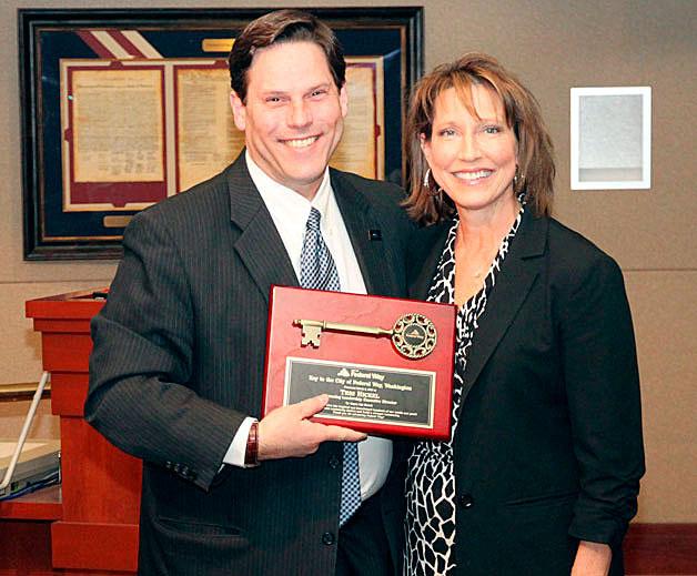 Mayor Jim Ferrell presented the Key to the City to Advancing Leadership's founding Executive Director Teri Hickel on March 3.