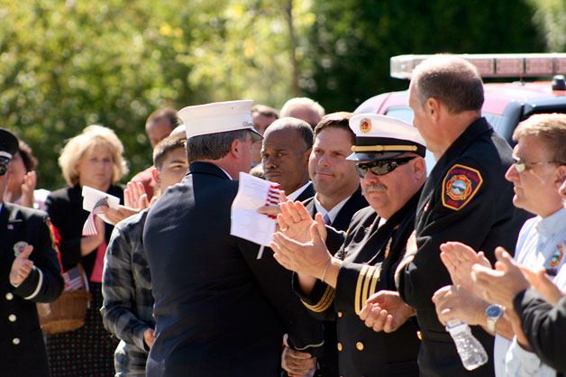 South King Fire and Rescue firefighters and special guests greet Mayor Jim Ferrell during a 9/11 memorial event in 2014. The fire district will host a memorial again this year at Station 64