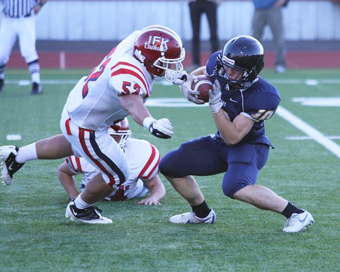 Decatur High School senior Michael Klavuhn returns a kickoff during the Gators’ season opening loss to the Kennedy Catholic Lancers Friday night. The ninth-ranked Lancers jumped out to a 47-0 lead during the third quarter and won 47-6.