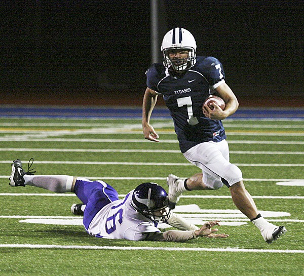 Todd Beamer senior quarterback T.J. Esekielu leads the Titans into their first-ever postseason appearance on Saturday against the Skyview Storm at 4 p.m. at the Kiggins Bowl in Vancouver. Beamer finished 4-5 during the regular season.