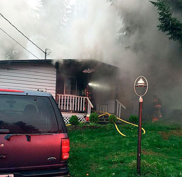 South King Fire and Rescue responded to a house fire in Federal Way Friday morning. Two were injured with smoke inhalation.