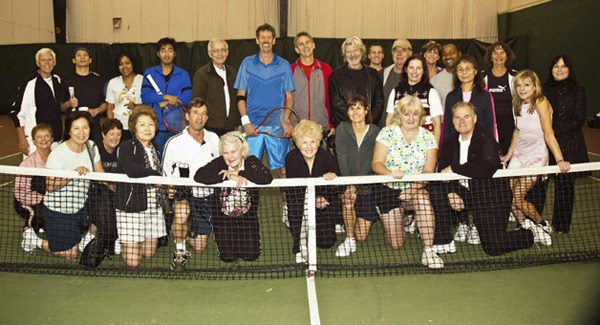 Tennis enthusiasts gathered for a potluck lunch Dec. 8 at Bally Total Fitness