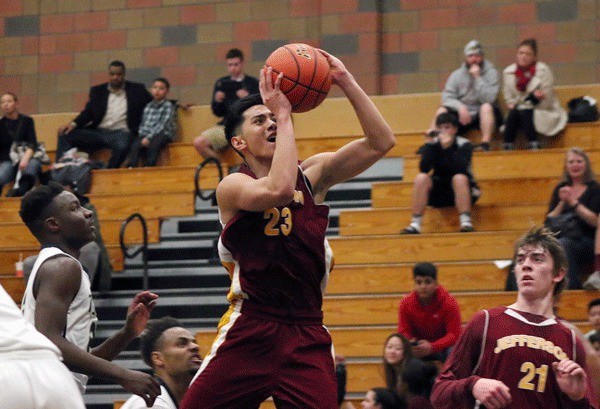 Kobee Mendoza drives to the basket during the fourth quarter of Thomas Jefferson's 62-57 win over Todd Beamer on Tuesday