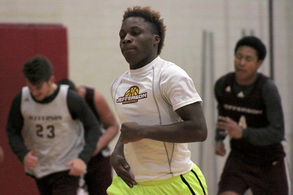 Kendell Harris runs during a conditioning drill at a Thomas Jefferson basketball practice on Jan. 6 at Thomas Jefferson High School.