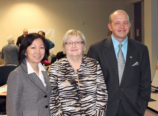 The 30th Legislative District precinct officers voted Carol Gregory (center)