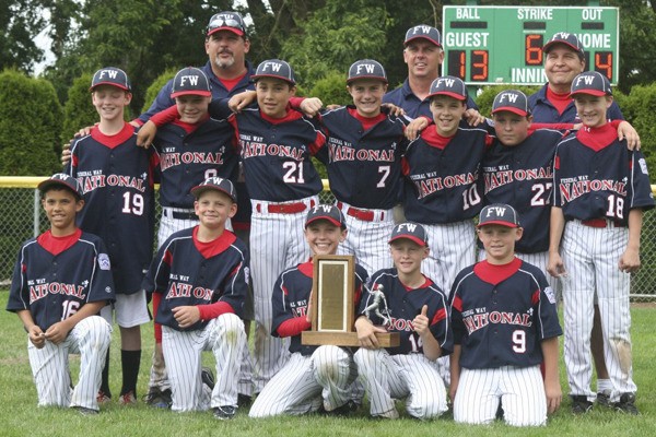 The Federal Way National 10- and 11-year-old all-star team won the District 10 Little League baseball championship last weekend with a 13-4 win over Auburn. The team now advances to the state tournament.
