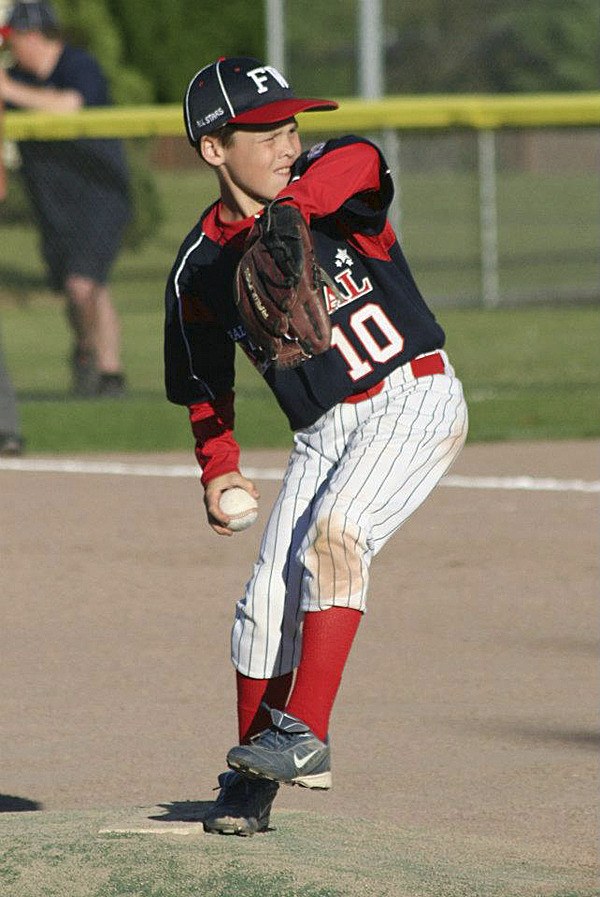 Federal Way National Little Leaguer Spencer Sugg throws a pitch during the District 10 9-10 All-Star Baseball Tournament at GSA Park in Auburn. Federal Way will face Kent in the district championship.