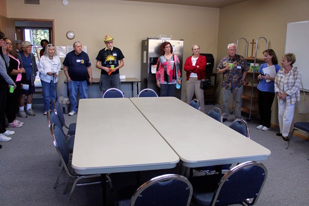 Volunteers gather at the Good Shepherd Episcopal Church to view Reach Out's women's shelter