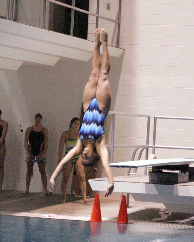 Federal Way High School diver Tia Thomas competed during the state swim meet at the King County Aquatic Center in Federal Way last weekend.