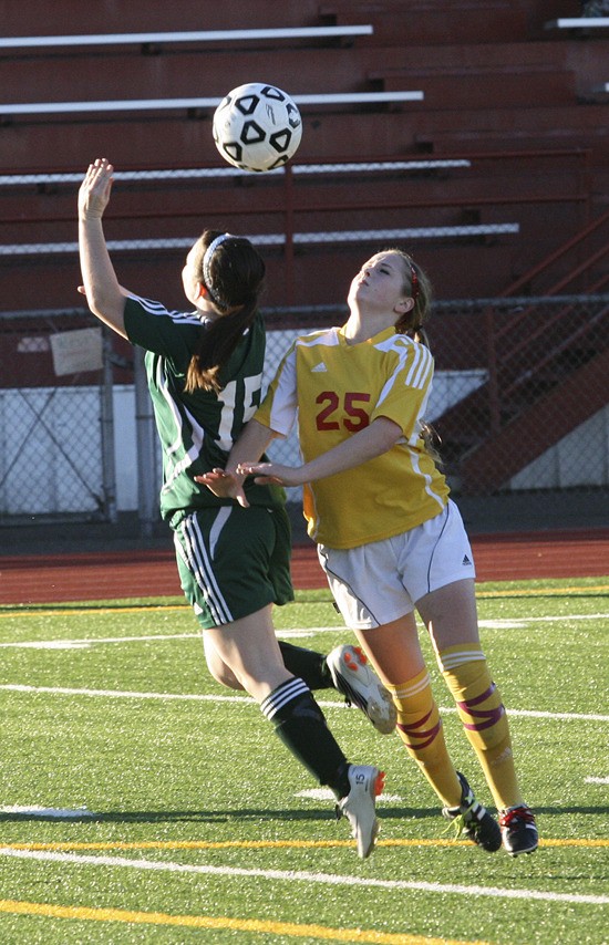 Thomas Jefferson junior Kenna Friedman goes up against an Emerald Ridge defender during the Raiders' 2-1 loss Wednesday at Federal Way Memorial Stadium at the SPSL Tournament. Friedman tallied the Raiders' only goal of the game.