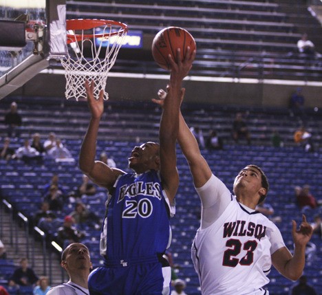 Federal Way senior Robert Christopher goes up for a layup during the Eagles' win over the Wilson Rams Saturday at the Class 4A State Boys Basketball Tournament in the Tacoma Dome. Christopher finished with 11 points.