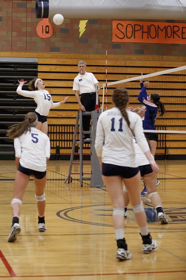 Todd Beamer junior Megan Huff goes up for a spike during the Titans' five-game loss to Graham-Kapowsin Wednesday night in SPSL South action. Huff finished with 20 kills.