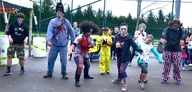 Zombies about to take off at the first Federal Way Freaky 5k Zombie run on Oct. 25 at Celebration Park.