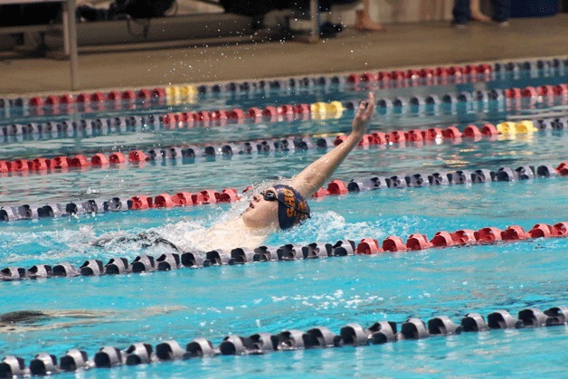 A swimmer competes during the SPSL South swim meets on Dec. 16 at the Weyerhaeuser King County Aquatic Center.