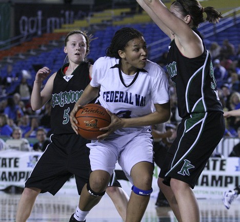 Federal Way High School graduate Talia Walton hit a late 3-pointer to lead the University of Washington to a 59-58 win over San Diego State Wednesday. The Huskies came back from a 19-point deficit.