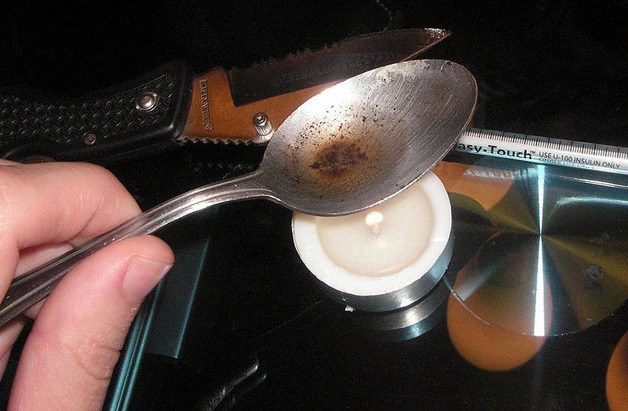 One method for preparing heroin for injection.