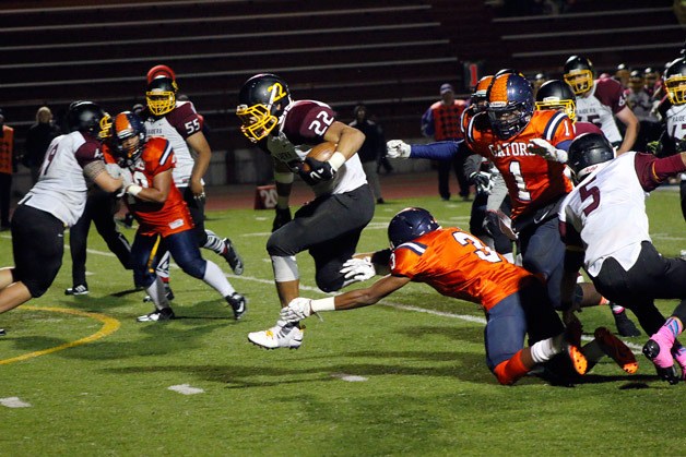 Kenny Turner breaks away for a 23-yard touchdown run during Thomas Jefferson's 22-3 win over Decatur on Thursday