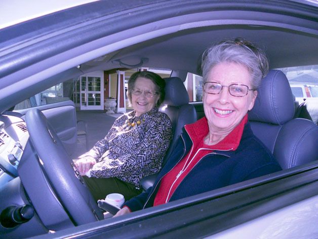 Geraldine Mensink and Linda Bauer smile as they head off for a ride on a recent afternoon.