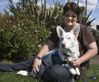 Casper the therapy dog and his owner