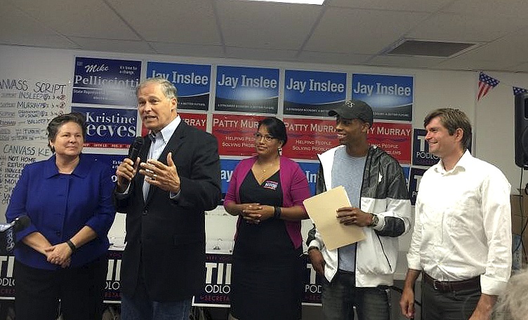 Gov. Jay Inslee (second from left) encourages the community to vote during his Get Out The Vote tour. Inslee was in Federal Way on Monday as one of his stops. Candidates for the 30th Legislative District Kristine Reeves (center) and Mike Pellicciotti (far right) were also in attendance. Contributed photo