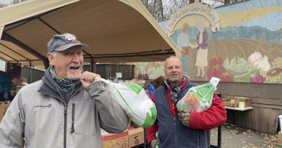 Volunteers help hand out Thanksgiving turkeys on Nov. 21. Photo courtesy of Shelley Pauls