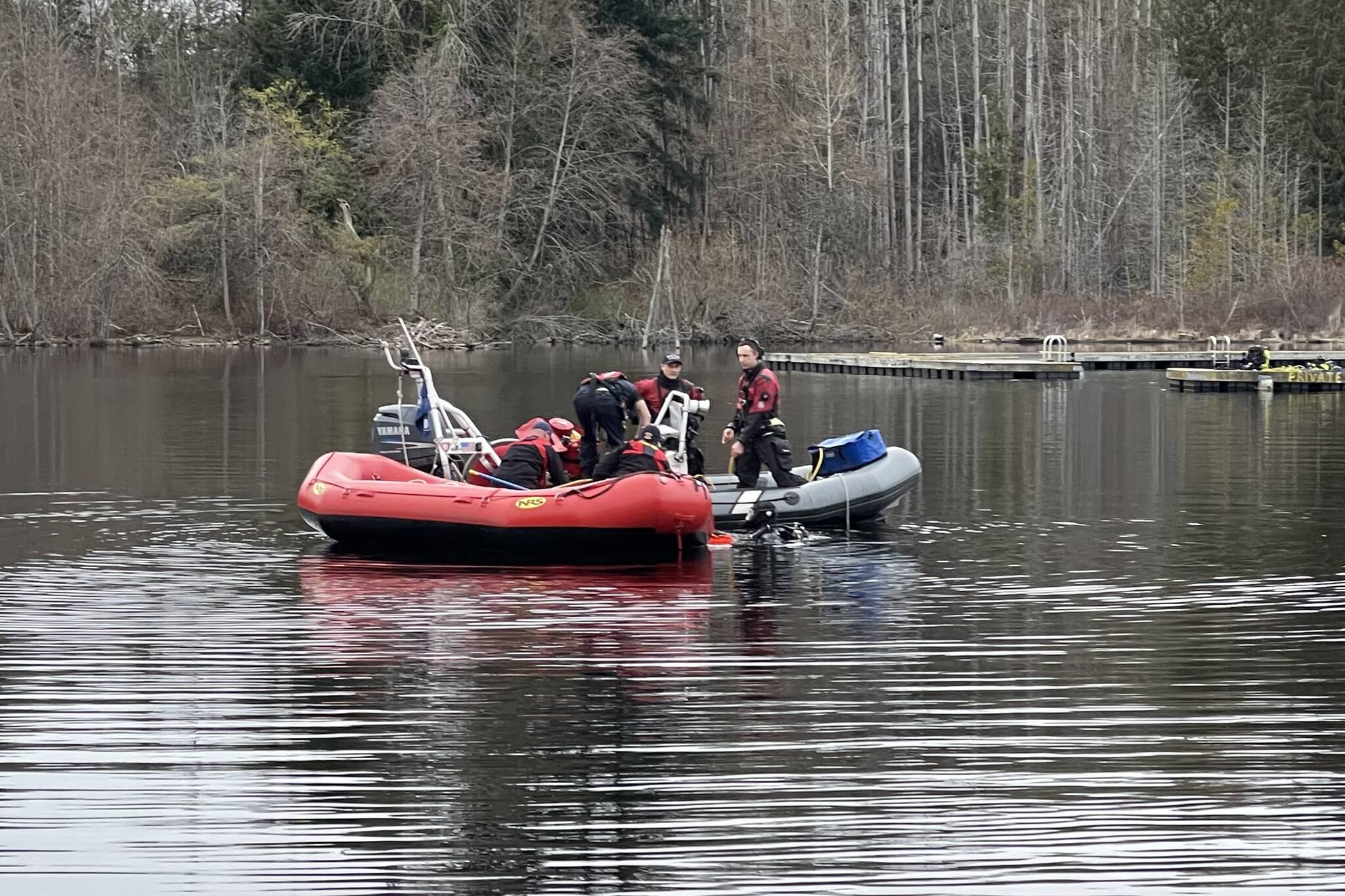 Rescue divers search Five Mile Lake in Auburn on April 5 for a fisherman who went into the water to help a kayaker. Photo courtesy of South King Fire and Rescue