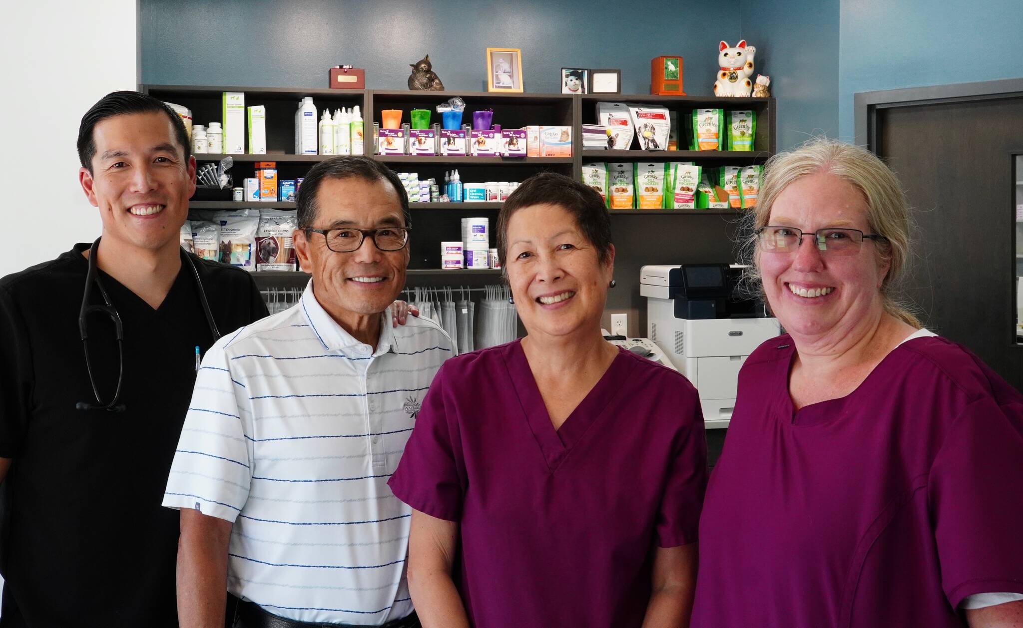 Robert Mizumoto, Michael Mizumoto, Margaret Mizumoto and Sarah James pose for a picture in the lobby of their newly renovated facility. Photo By Joshua Solorzano/Sound Publishing