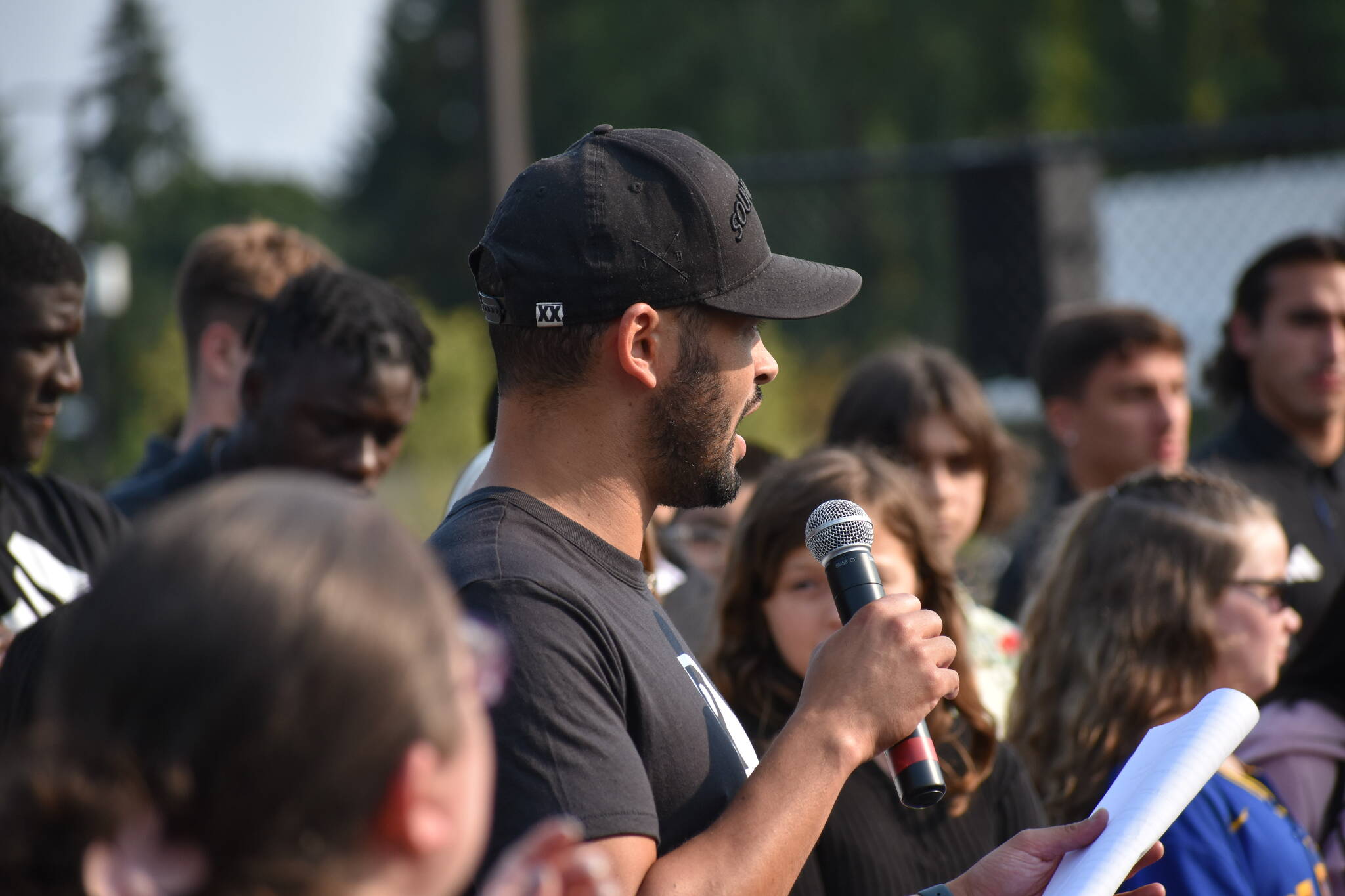 TJHS alumni Lamar Neagle speaks to parents and students at Olympic View. (Ben Ray/The Mirror)