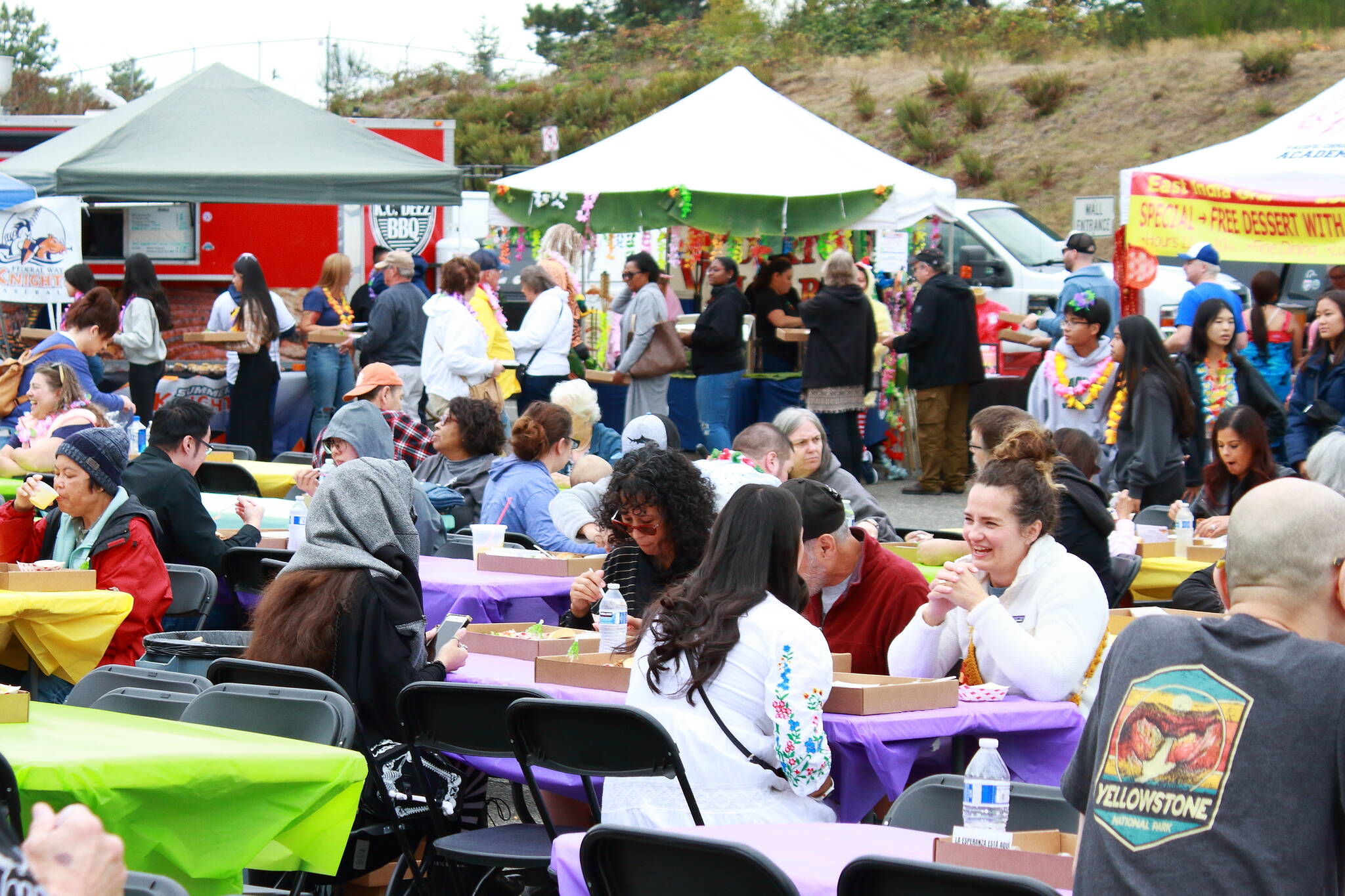 Even with a line outside and a parade of event-goers moving from booth to booth to get their array of food, the tables were full of happy guests at Taste of Federal Way. Photo by Keelin Everly-Lang/The Mirror