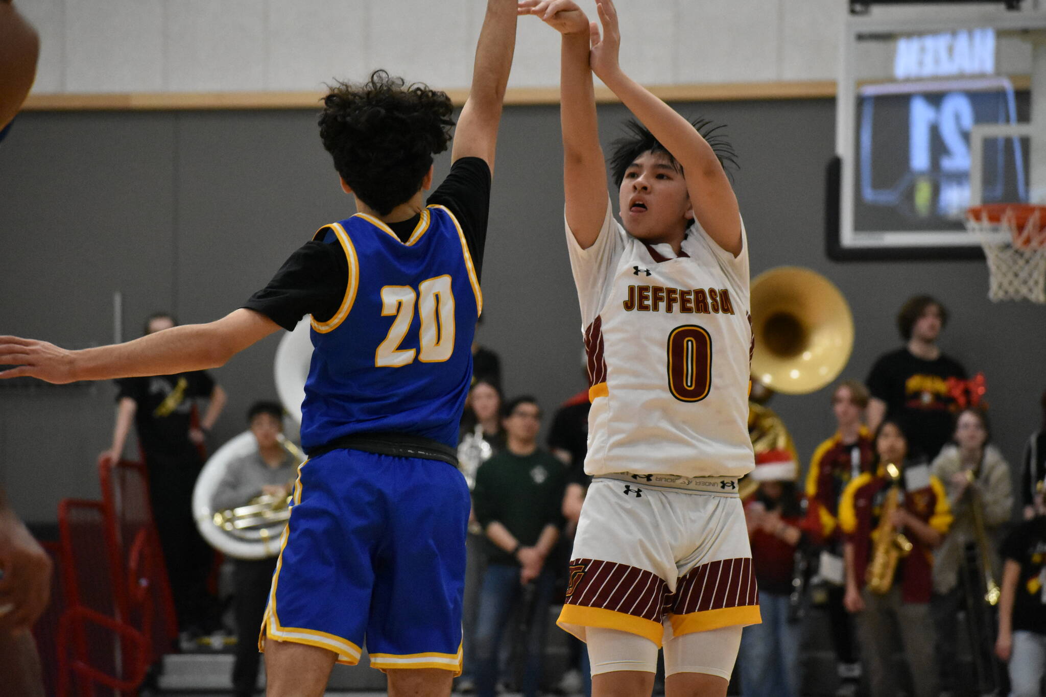 Alex Le takes a three point shot against Hazen. Ben Ray / The Mirror